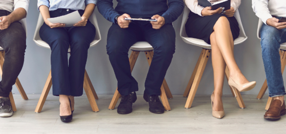 picture of applicants waiting to be interviewed by recruiter
