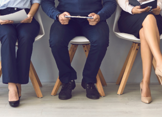 picture of applicants waiting to be interviewed by recruiter